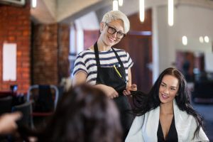 Hairdresser working on the client